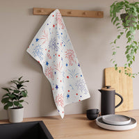 Printify eco-friendly tea towels with red and blue firework design hanging in modern kitchen