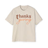 Printify eco-friendly Thanksgiving shirt men in beige with brown and orange thanksgiving text