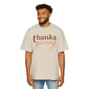 Men wearing Printify eco-friendly Thanksgiving shirt men in beige with Thanksgiving text design
