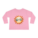 Pink eco-friendly toddler long sleeve shirt with cute sun wearing sunglasses print