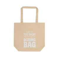 Printify eco-friendly tote bag in beige with white text saying Life is too short to carry a boring bag