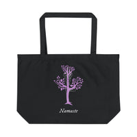 Black eco friendly tote bag with purple tree and yoga pose design by Printify