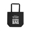Black eco-friendly tote bag with white text Life is too short to carry a boring bag