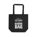 Black eco-friendly tote bag with white text Life is too short to carry a boring bag