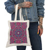 Printify eco-friendly tote bag with colorful mandala design held by person wearing denim jacket