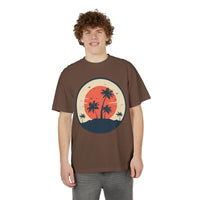 Printify brown eco-friendly unisex graphic tee with retro palm tree sunset design worn by smiling model