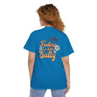 Back view of blue eco-friendly unisex pocket tee with Feeling a Little Salty design and floral print