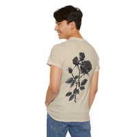 Printify eco-friendly unisex t-shirt with black rose design worn by a smiling man