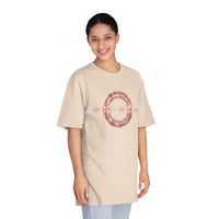 Printify eco-friendly unisex t-shirt in beige with circular graphic design worn by smiling model