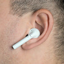 Close-up of ear wearing Printify eco-friendly wireless earbuds in white for tech accessories