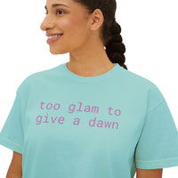 Printify eco-friendly women's graphic tee in light blue with pink text saying too glam to give a dawn