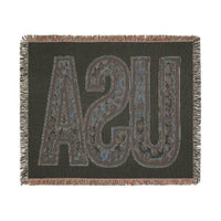 Printify eco-friendly woven blanket with USA lettering and fringed edges in dark tones