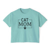 eco-friendly cat mom shirt Printify light teal cropped tee with black CAT MOM text and paw print