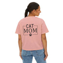 Back view of woman wearing pink eco-friendly cat mom shirt with black CAT MOM text and paw print