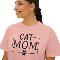 Smiling woman wearing Printify eco-friendly cat mom shirt pink tee with black CAT MOM text and paw print