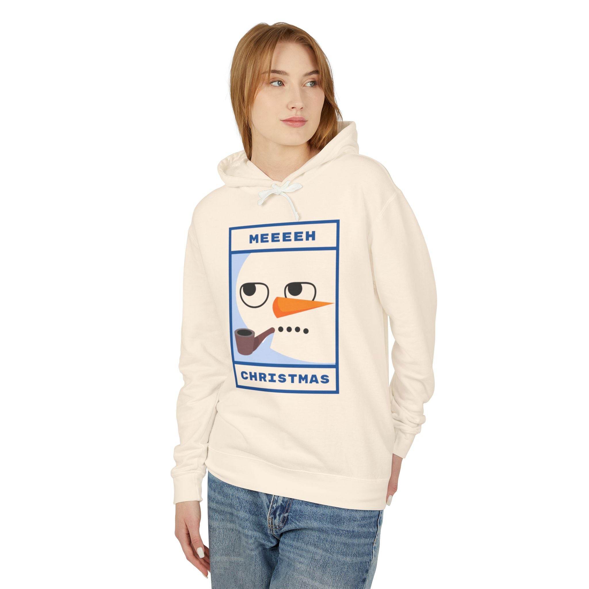 Printify cream hoodie with cartoon snowman face and pipe worn by model eco-friendly ugly Christmas hoodie