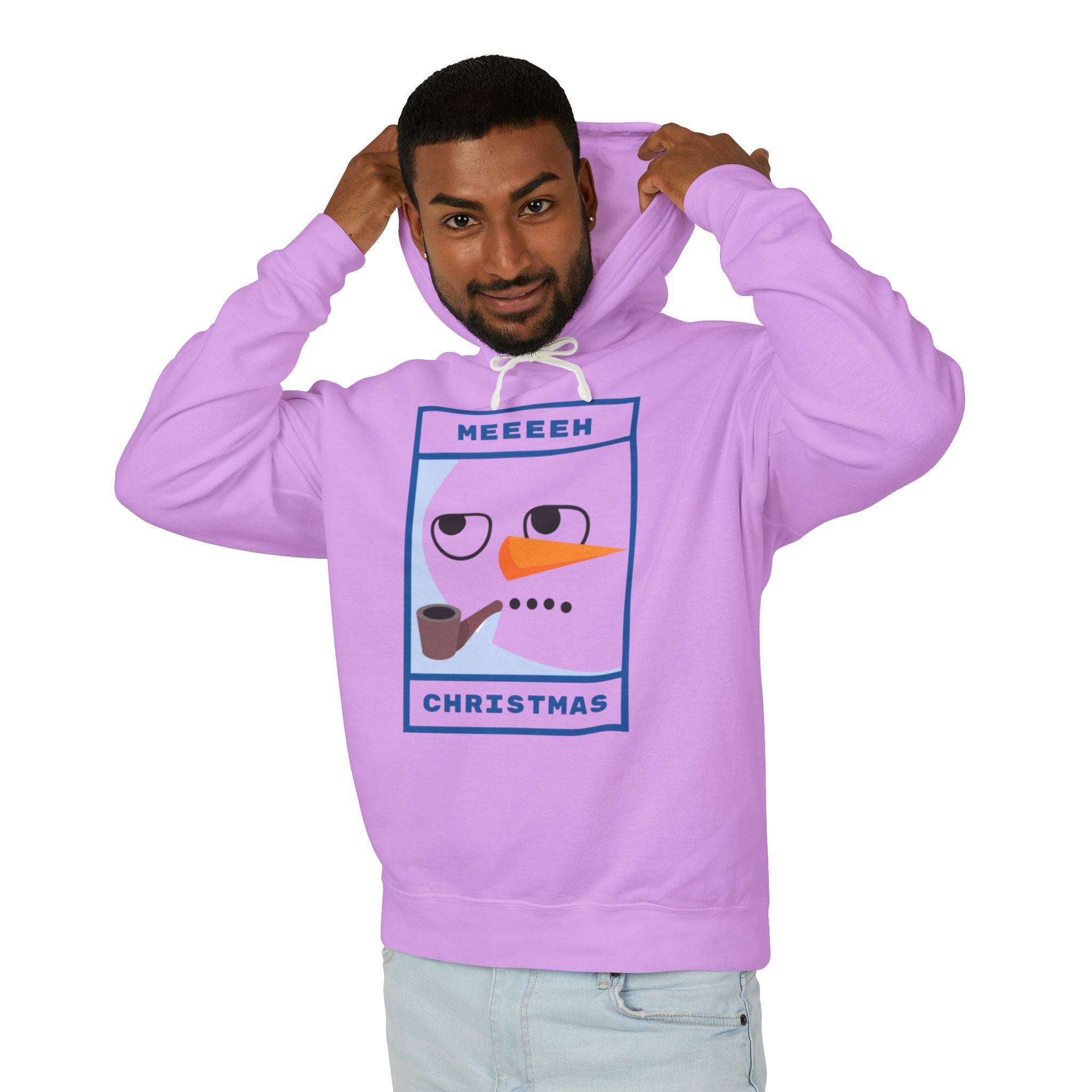 Man wearing Printify eco-friendly ugly Christmas hoodie in pastel pink with humorous snowman and pipe