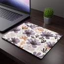 Printify floral rectangular mouse pad with purple and beige flower design on dark wood desk