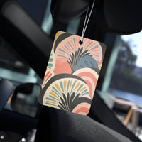 Printify eco-friendly car air fresheners with colorful abstract design hanging inside car