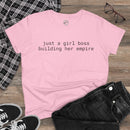 Printify eco-friendly girl boss shirt pink tee with just a girl boss building her empire text flat lay with jeans and sneakers
