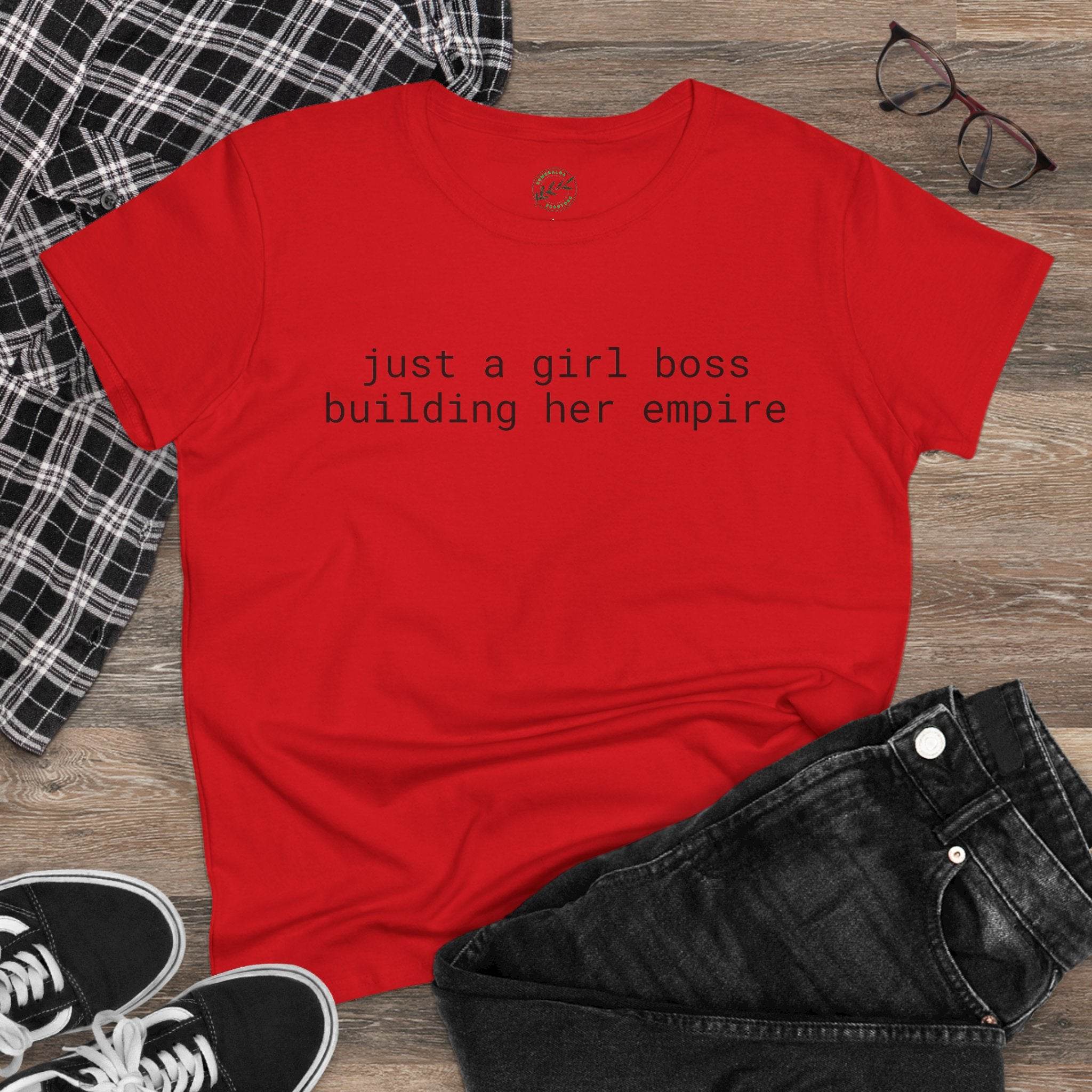 Red T shirt with printed slogan just a girl boss building her empire flat lay with jeans and sneakers eco-friendly girl boss shirt
