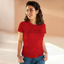 Woman wearing Printify red eco-friendly girl boss shirt with black text just a girl boss building her empire