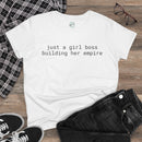 eco-friendly girl boss shirt white tee reading just a girl boss building her empire flat lay with black jeans sneakers and glasses
