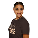 Printify smiling model wearing eco-friendly camping t-shirt dark brown with beige Camping Life print and crew neck