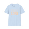 Printify light blue tee with CAMPING LIFE peach graphic eco-friendly camping t-shirt for outdoor lovers