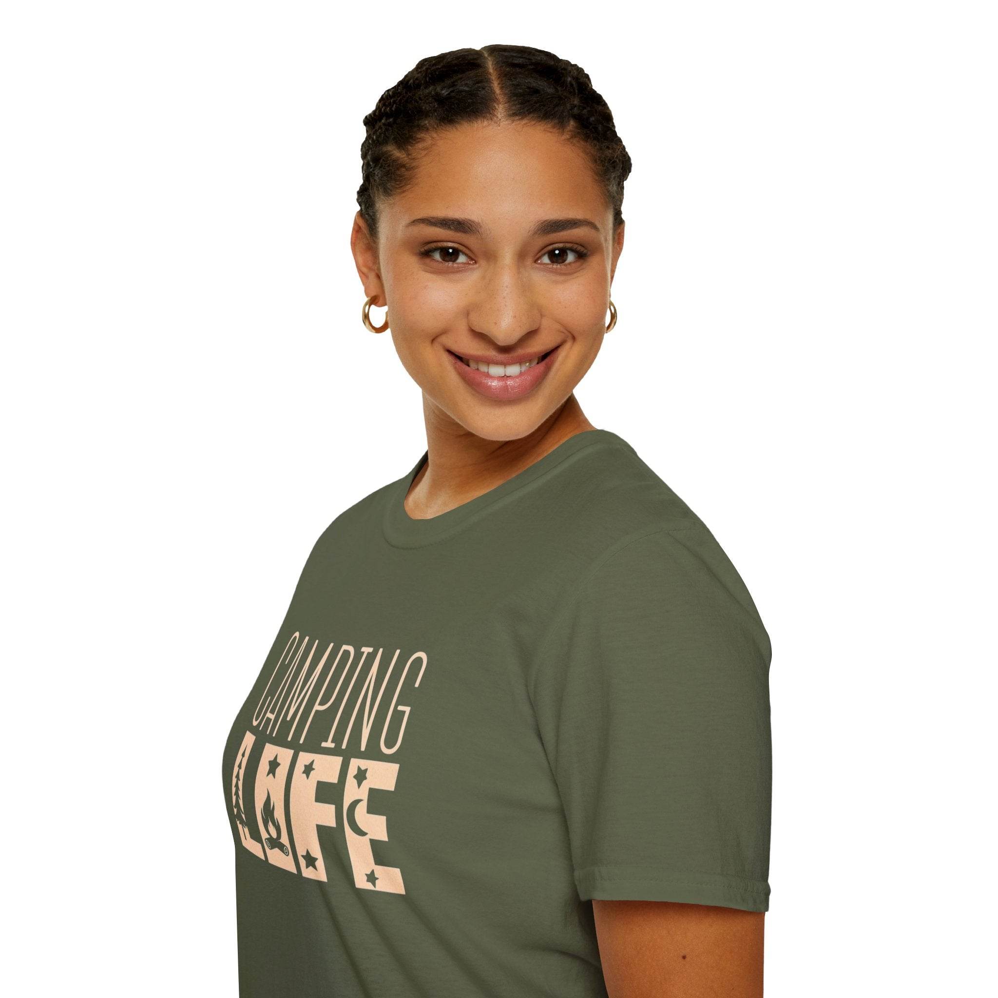Printify model wearing olive green eco-friendly camping t-shirt with Camping Life print smiling in studio