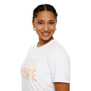 Printify eco-friendly camping t-shirt white crewneck with peach Camping Life print worn by smiling model