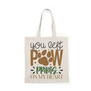 Printify eco-friendly paw print tote bag beige canvas with brown paw graphic and text you left paw prints on my heart