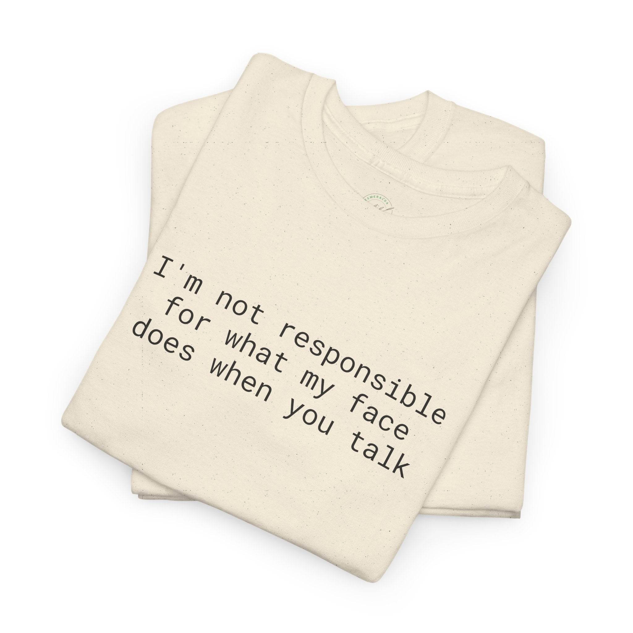 eco-friendly funny t-shirt folded cream tees with black minimalist text Im not responsible for what my face does when you talk