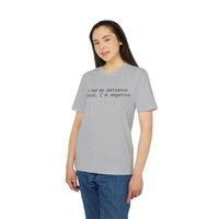 Young woman wearing gray eco-friendly unisex t-shirt with printed text I had my patience tested, I'm negative