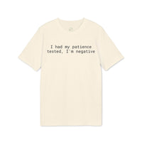 Printify cream tee with black text reading I had my patience tested Im negative eco-friendly unisex t-shirt
