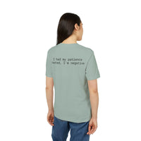 Back view of model wearing Printify sage tee with black text I had my patience tested Im negative eco-friendly unisex t-shirt
