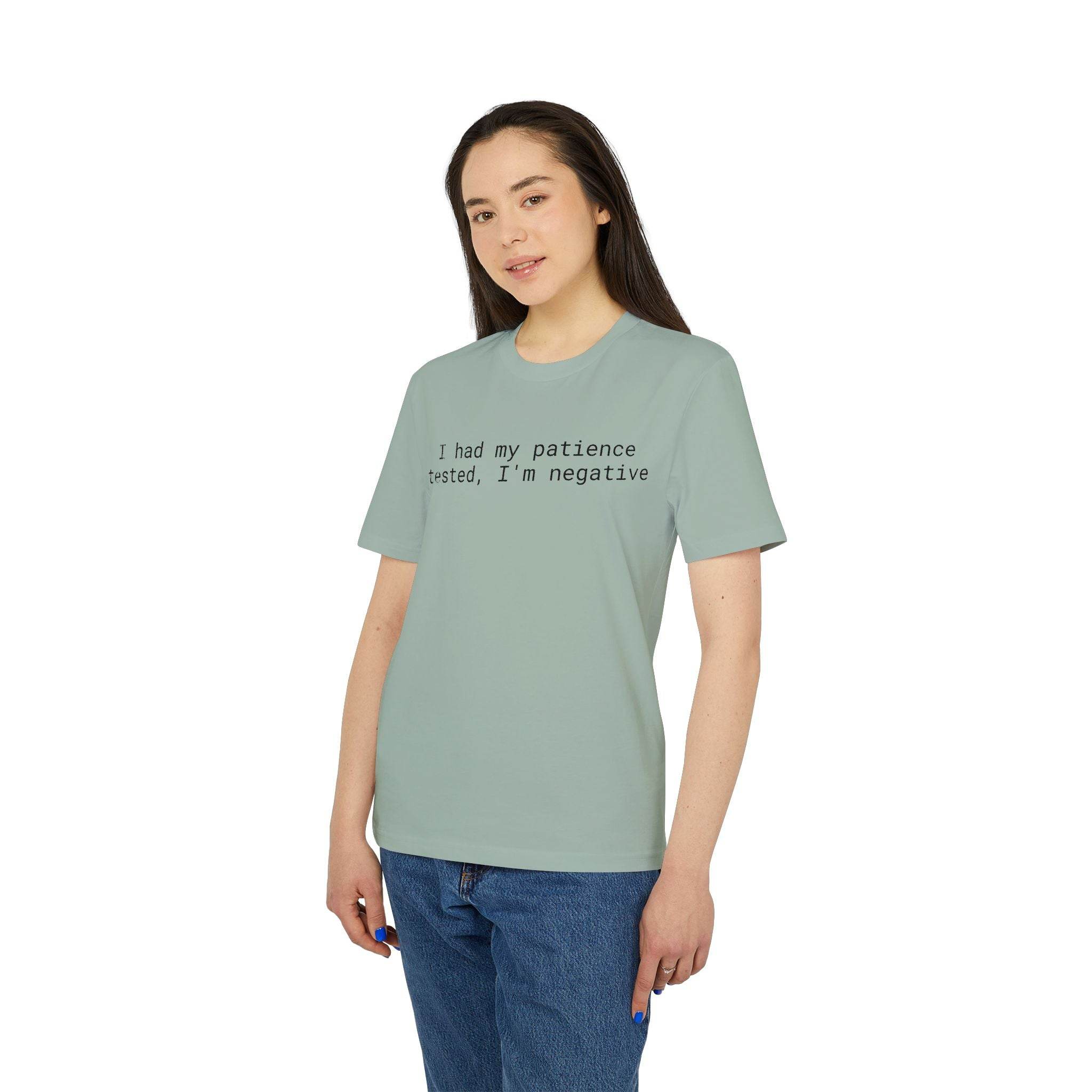Printify model wearing sage green eco-friendly unisex t-shirt with printed text I had my patience tested Im negative
