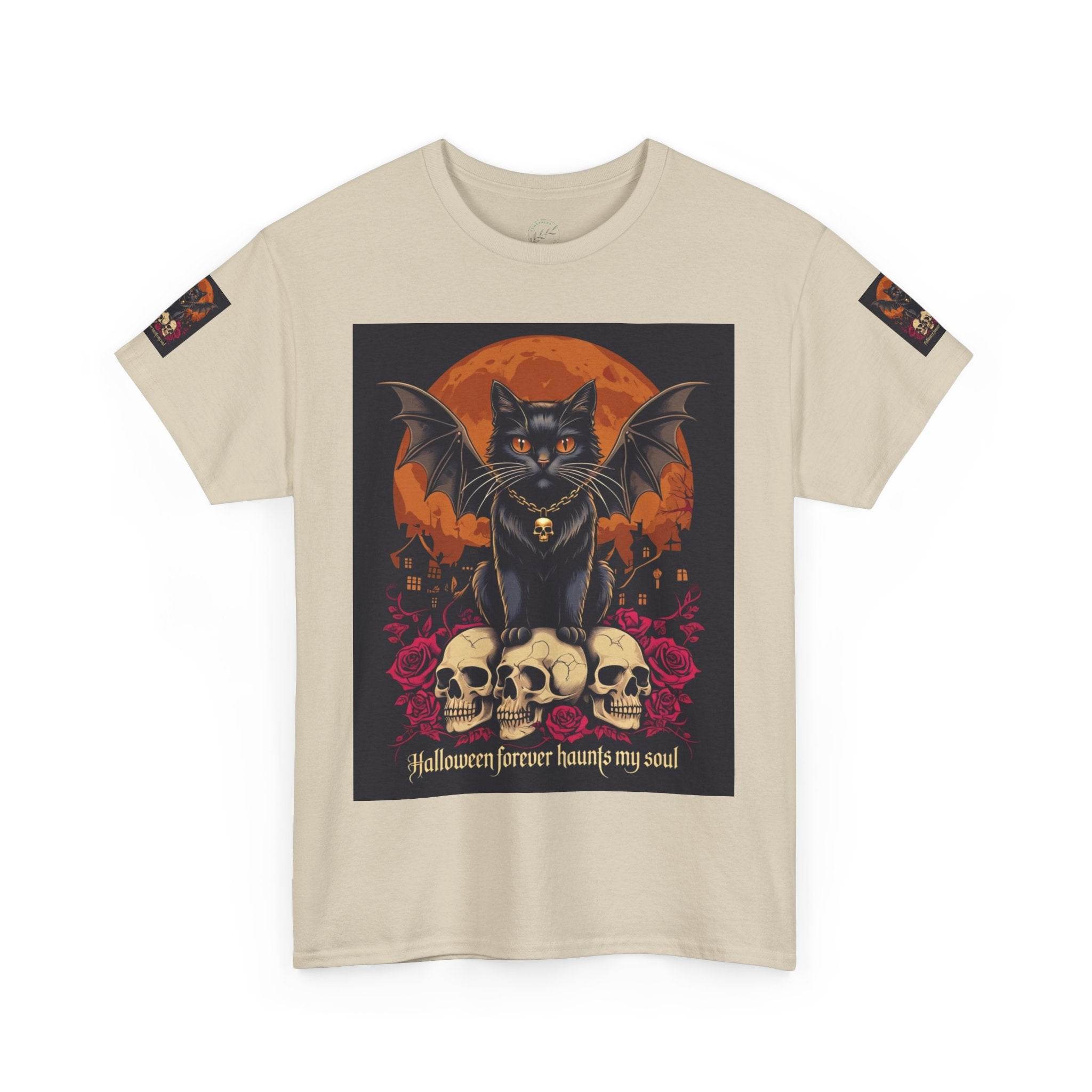 Printify eco-friendly Halloween cat shirt beige tee featuring a black winged cat perched on skulls and an orange moon