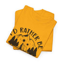 Printify yellow folded tees with mountain and trees graphic Id Rather Be slogan eco-friendly camping t-shirt for outdoor lovers