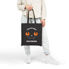Printify eco-friendly Halloween tote bag featuring black cat face with orange eyes and trick or treat text