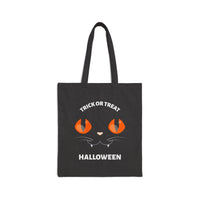 Printify eco-friendly Halloween tote bag with black cat eyes and Trick or Treat text