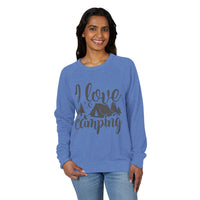 Smiling woman wearing light blue eco-friendly camping sweatshirt with I love camping tent and trees graphic