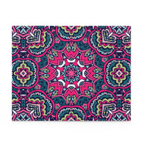 Colorful mystic mosaic puzzle with intricate geometric patterns in vibrant pink, green, and blue tones