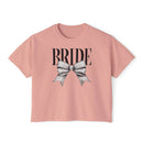 Printify pink cropped eco-friendly bridal t-shirt with BRIDE lettering and silver bow graphic