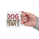 eco friendly ceramic dog mom mug white with leopard print DOG MOM design held by hand with red nails