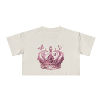 Petal & Crown eco crop shirt by Printify featuring a pink crown and butterflies design on a light beige crop t-shirt
