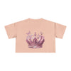 Printify Petal & Crown eco crop shirt in light pink with floral crown and butterfly design
