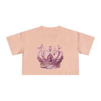 Printify Petal & Crown eco crop shirt in light pink with floral crown and butterfly design