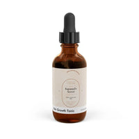 Rapunzel hair tonic for growth in brown dropper bottle labeled Rapunzel's Secret hair growth tonic