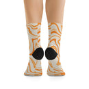 Printify recycled poly socks with orange and cream abstract swirl design and black heel patch
